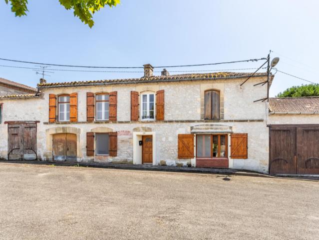 Village house with outbuildings and garden