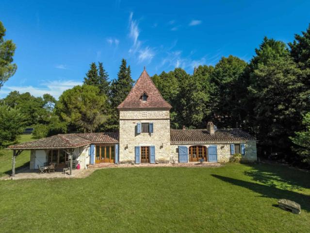 Village property with garden and view