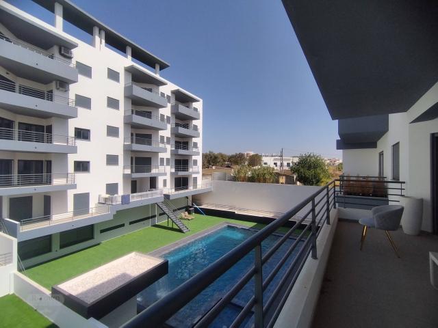 Viva com Elegância no Coração de Olhão — Apartamento Exclusivo com Piscina Privada!