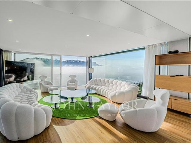 Vom Architekt entworfene Villa mit See und Alpenpanorama