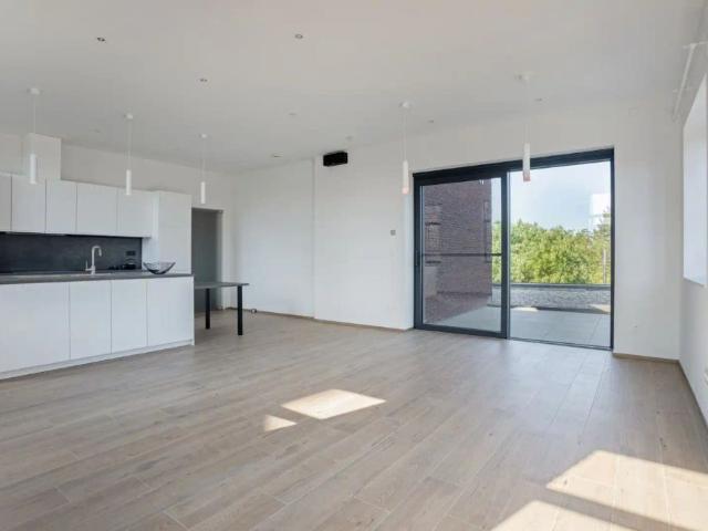 Volledig gerenoveerd appartement in Holsbeek met 3 slaapkamers en lift EPC 72 Kwh/m²