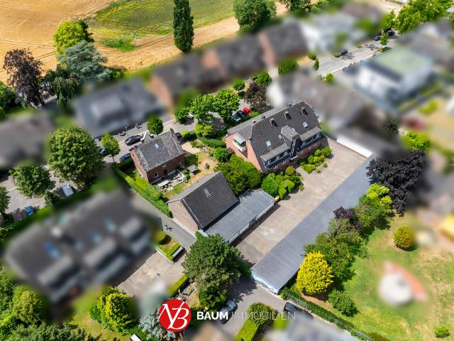 Vollvermietetes Immobilien Ensemble mit großem Garagenhof in absoluter Top Wohnlage von MB Büderich