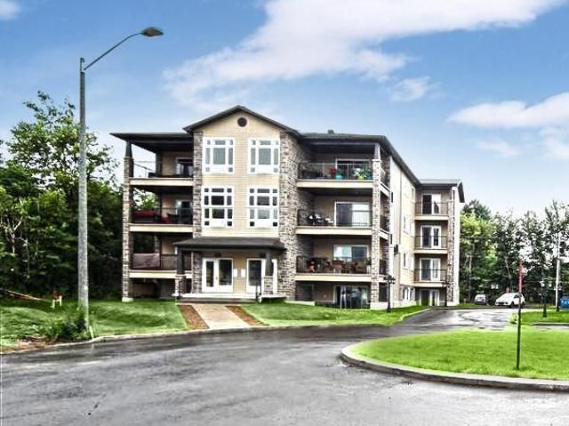 VOTRE REFUGE MODERNE | Grand 4½ Rez de Jardin à Val Bélair