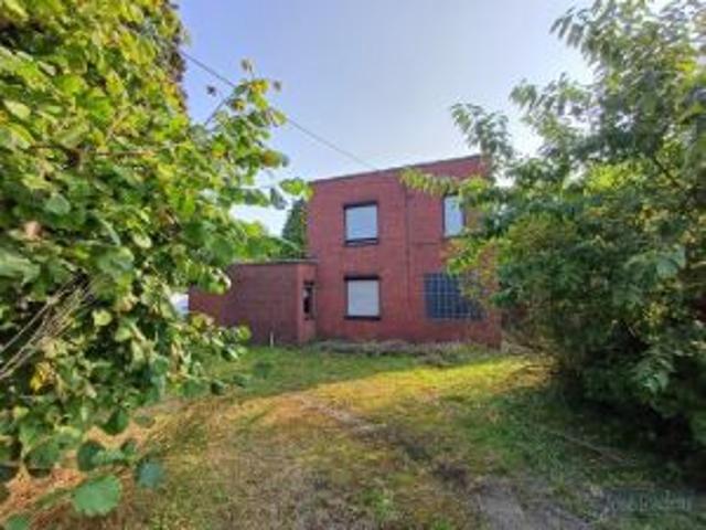 Vrijstaande woning met garage en grote tuin