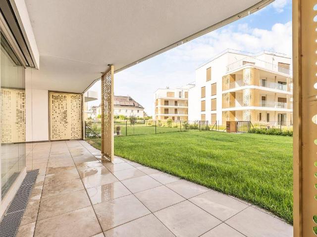 Wasserlage & Wohlgefühl: Ihr privates Refugium mit 130m2 Grünfläche Das Herzstück