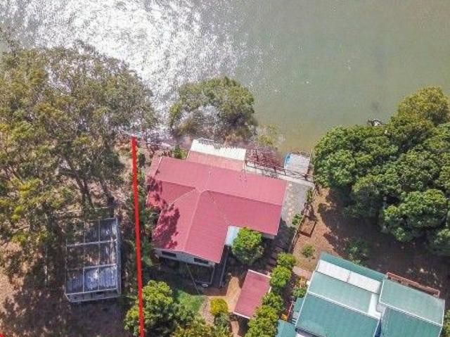 Waterfront Bliss Awaits â Finish Your Dream Retreat!