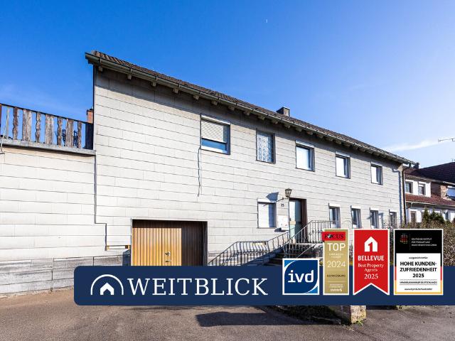 WEITBLICK: 2 Familienhaus mit Ausbaupotential!