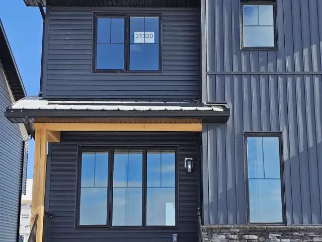 Welcome to this beautiful duplex home in Creekstone, SW Calgary