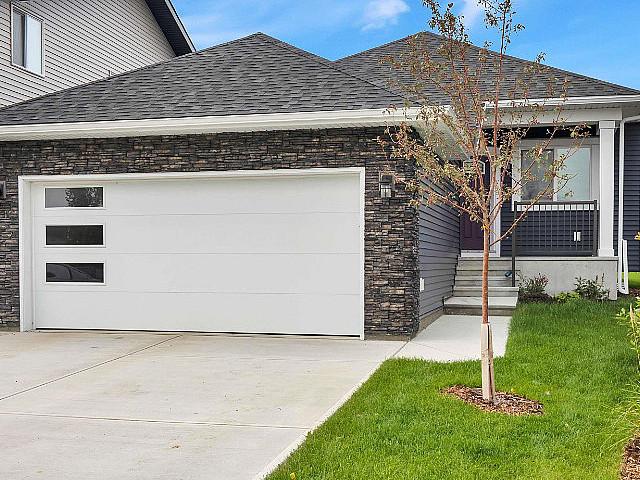 Welcome To This Modern 1279sqft Bungalow Located In Copperhaven!