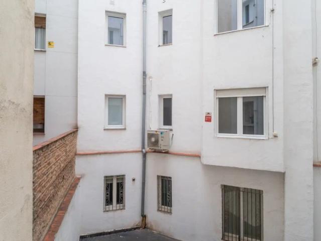 Welcoming room with desk in shared apartment, Chamberí