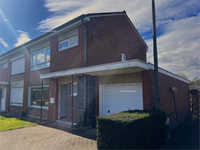 Welgelegen, te renoveren halfopen bebouwing met zongerichte tuin + garage