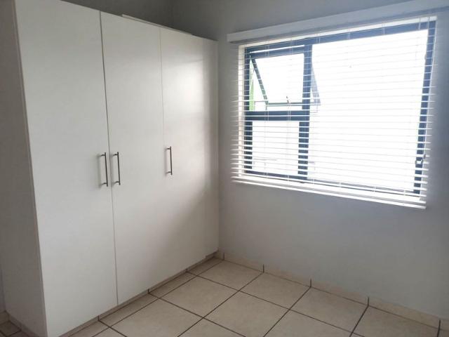 Well Maintained Top Floor Unit