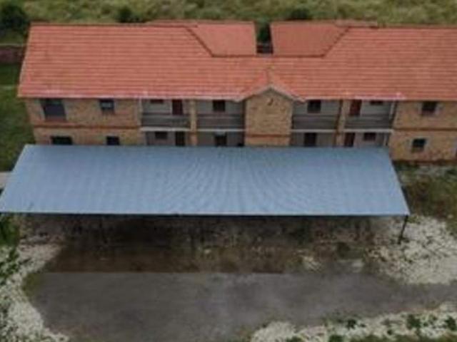 Well situated residential property improved with thirteen double storey apartment blocks accommodati