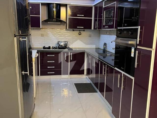 West open on 60ft wide road Well mainatined looks like new condition Ground floor portion for sell. Having 3 bed drawing dinning Near ilma university. Family visits only