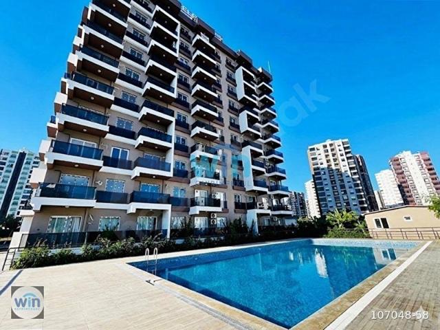 WİN'DEN TECEDE HAVUZLU SİTE İÇİNDE YAZ KIŞ KULLANIM SATILIK 1+1