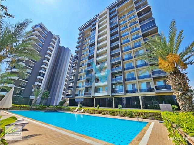 WIN'DEN DORA EXXEN'DE DENİZ MANZARALI SATILIK GENİŞ 1+1 DAİRE