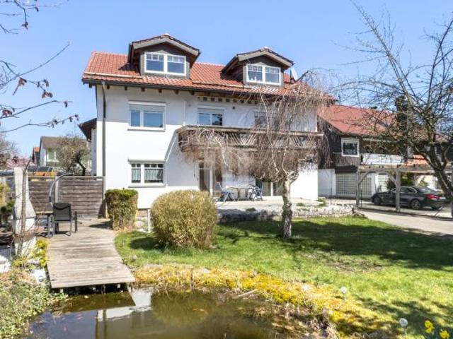 WINDISCH IMMOBILIEN Für Kapitalanleger gepflegtes Zweifamilienhaus auf großem Grundstück