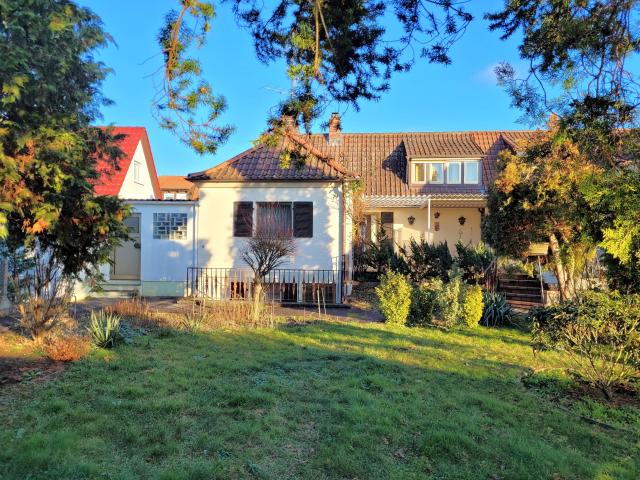 Willkommen Zuhause! Hübsche Siedler DHH mit herrlichem Garten in Erlangen Bruck
