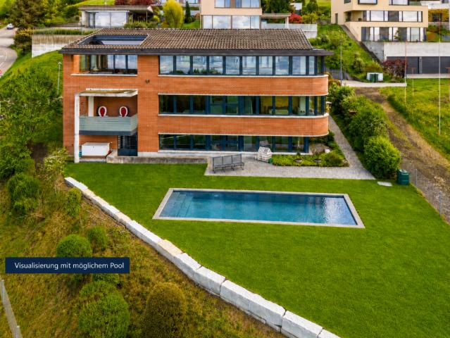 WO DER SEE ZUM PANORAMA WIRD: EXKLUSIVES EINFAMILIENHAUS AUF GROSSZÜGIGEM GRUNDSTÜCK