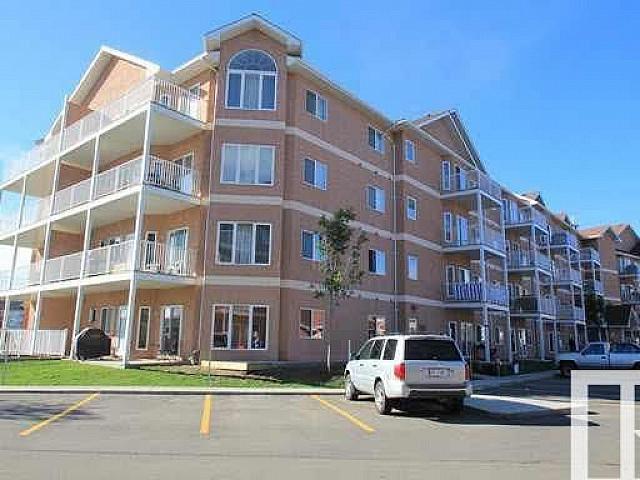 Wonderful Top Floor Unit With Gorgeous Vaulted Ceilings!