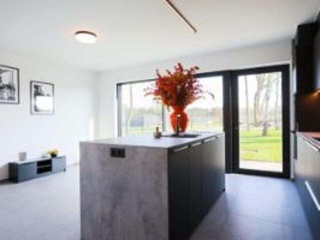 WONEN IN EEN T HUIS IN DE MEEST ENERGIEZUINIGE WIJK VAN.