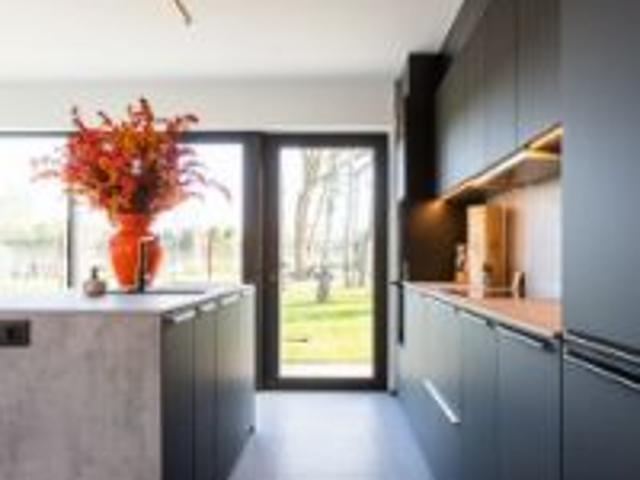 WONEN IN EEN T HUIS IN DE MEEST ENERGIEZUINIGE WIJK VAN.