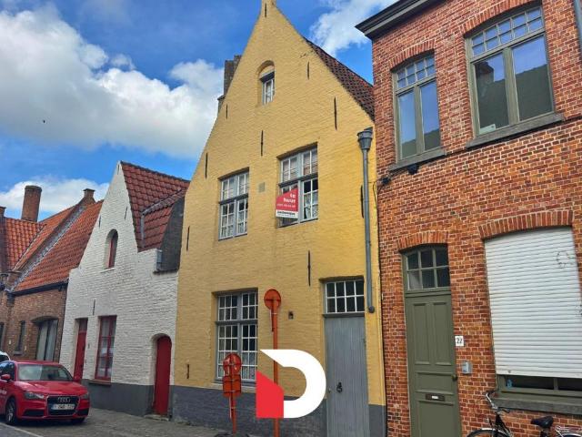Woning in centrum Brugge met 4 slaapkamers en een gezellige stadstuin