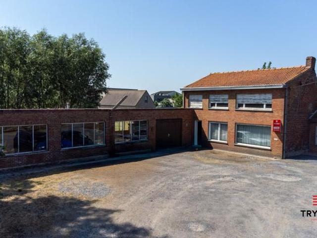 Woning met magazijn op 1203 m² – veel potentieel