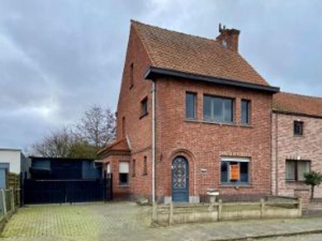 Woning met grote werkplaats