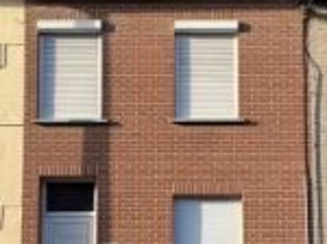 Woning met 2 slaapkamers, tuin en garage te Roeselare