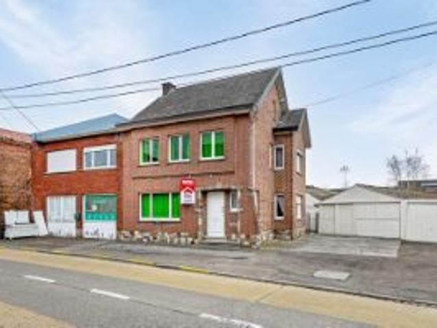 Woning met 3 slks en grote loods