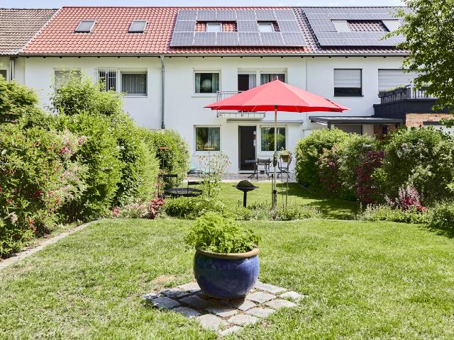 Wohlfühlen auf den ersten Blick – charmantes Reihenmittelhaus mit liebevoll angelegtem Garten!