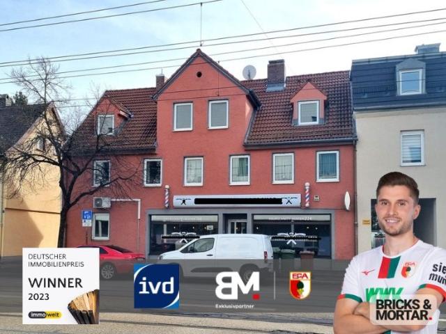 Wohn und Geschäftshaus mit Baugenehmigung für weiteren Wohnraum mit Dachterrasse