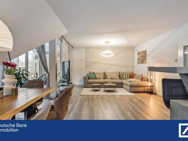 Wohnen auf höchstem Niveau Top DG Wohnung in zentraler Lage