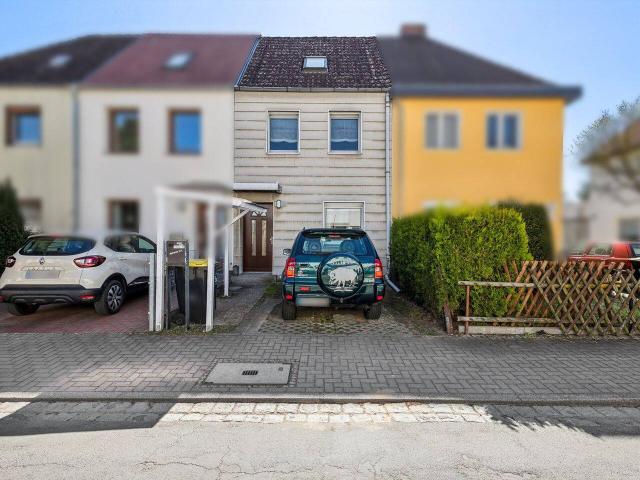 Wohnen & erweitern: Reihenhaus mit Dachausbau Möglichkeit