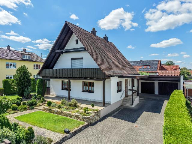 Wohnen mit Wohlfühlcharakter – Einfamilienhaus mit Wintergarten und großzügigem Garten