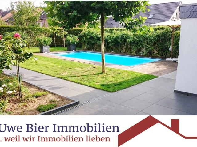 Wohnen wie im Urlaub Traumhaus mit Pool wartet auf Sie!