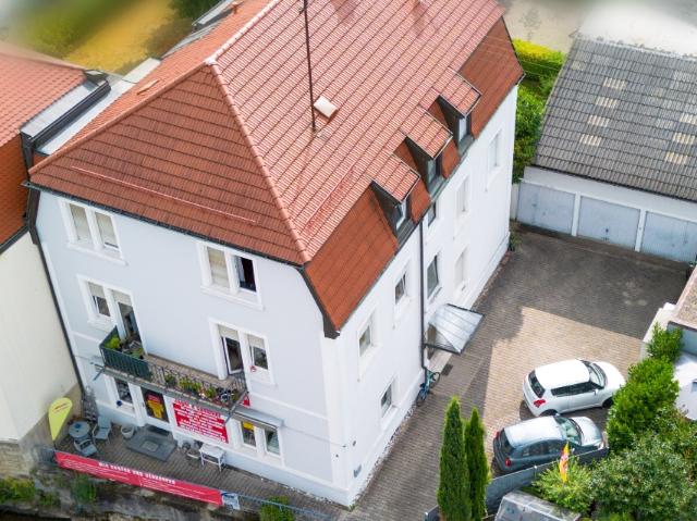 Wohnhaus in gesuchter Lage 4 Wohnungen + Ladenlokal