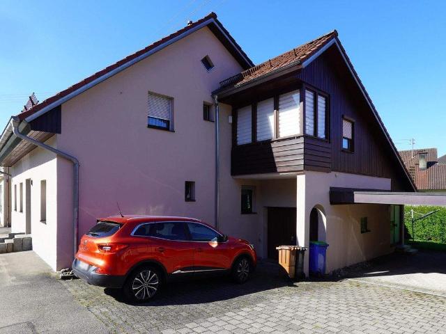 WOHNHAUS MIT ZWEI VERMIETETEN EINHEITEN