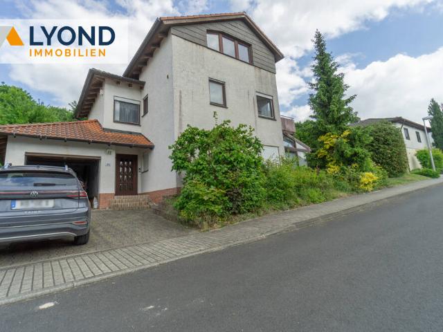 Wohnoase für die ganze Familie: Frei stehendes Haus mit großem Garten und Wintergarten!