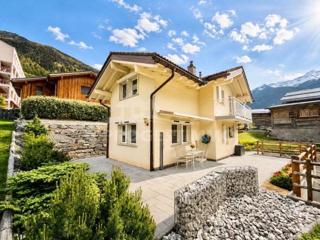 WOHNSITZ MIT CHARME, KOMFORT UND PRIVILEGIERTER ALPINER LAGE