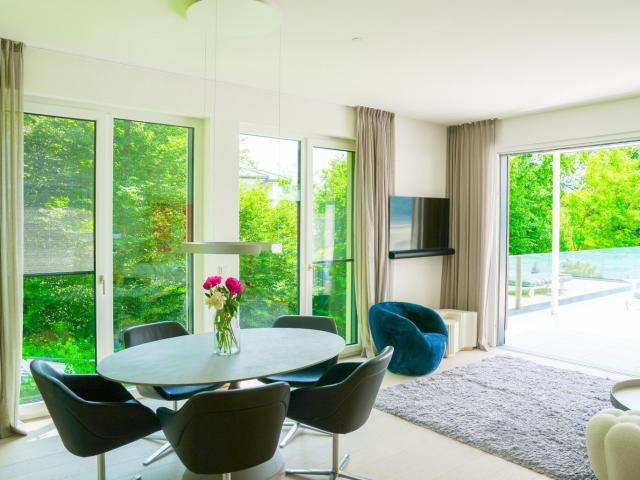 Traumwohnung am Nordufer mit Wörtherseeblick Seezugang Outdoorpool Fitness & Sauna