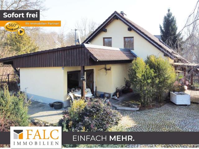 Wunderschönes Einfamilienhaus in Holzoptik mit Wintergarten, Terrassen, Garagen