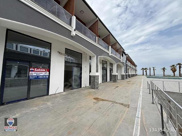 YENİFOÇA BİVALOFT PROJESİNDE SATILIK HAVUZ CEPHE SATILIK 1+1 DAİRE