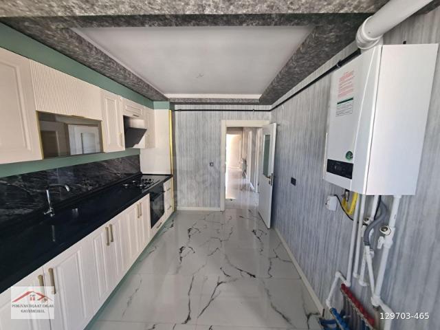 YENİKENT'TE MERKEZİ KONUMDA GİY.ODA E.BANYO FUL YAPI ARA KAT 3+1