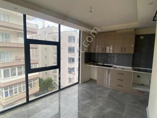 Yonca'dan Mezitli Kuylukta Güzel Lokasyonda Kiralık Daire