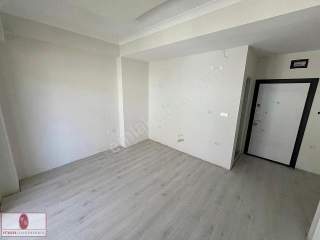 Yükselden Fırsat! Akçayda Sıfır Binada Geniş M2 Lüks Satılık 1+1