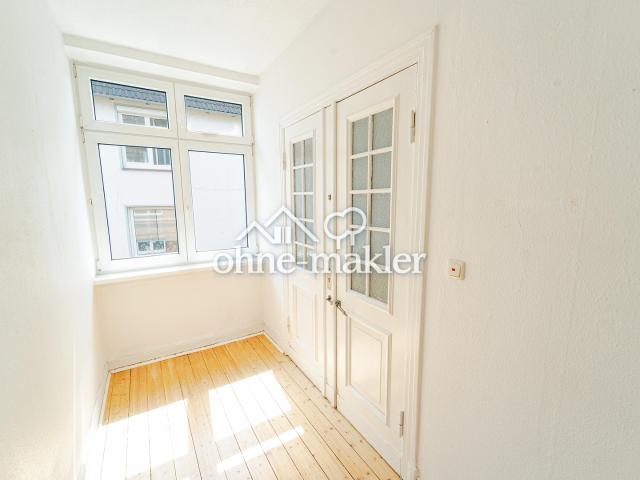 Zauberhafte Altbauwohnung mit Balkon und Gartennutzung im Herzen Lübecks