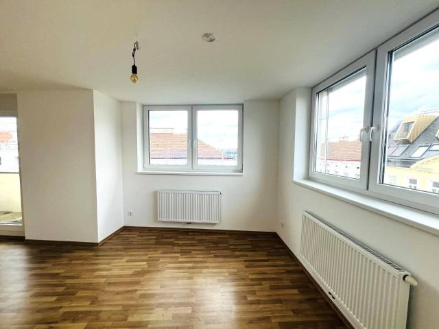 Exklusive 3 Zimmer Dachgeschoßwohnung mit zwei Freiflächen und hochwertiger Einbauküche zu kaufen in 1150 Wien