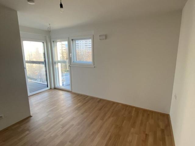 ZENTRALE 3 Zimmerwohnung mit gemütlicher Loggia, Tiefgaragenparkplatz und perfekter Anbindung